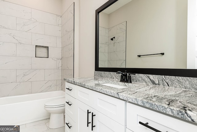 full bathroom with tiled shower / bath combo, tile flooring, toilet, and vanity