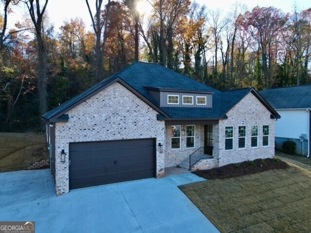 view of front of property with a garage