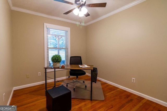 office area with hardwood / wood-style flooring, ceiling fan, and ornamental molding