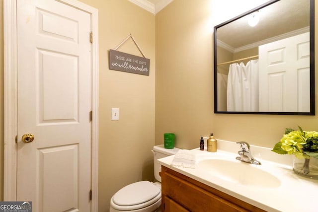 bathroom featuring walk in shower, crown molding, vanity, and toilet