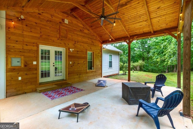 view of patio featuring ceiling fan and french doors