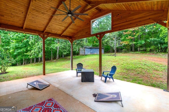 view of patio / terrace with a storage unit and ceiling fan