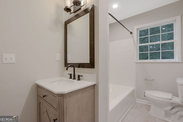 full bathroom with shower / tub combination, tile floors, vanity, and toilet