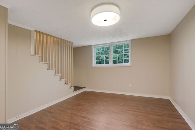 basement featuring hardwood / wood-style floors