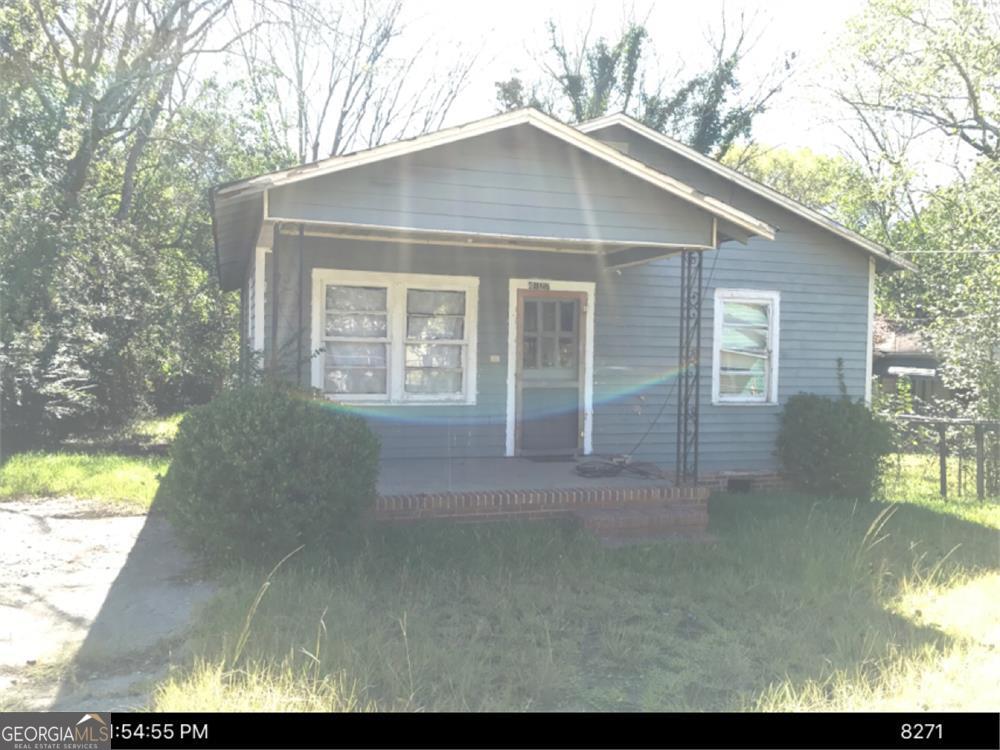 bungalow-style home featuring covered porch