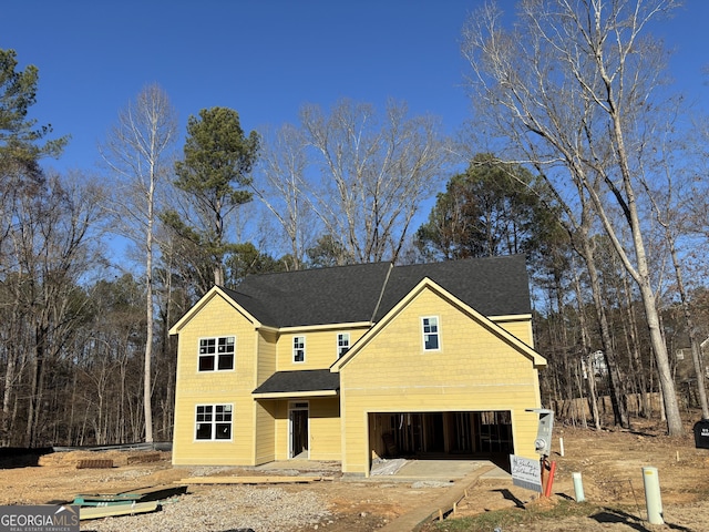 view of front of property featuring a garage