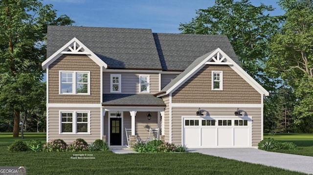 view of front of home with a front lawn and a garage