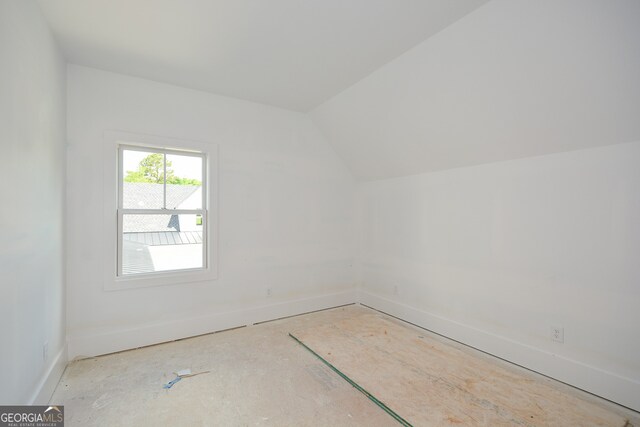 bonus room featuring vaulted ceiling