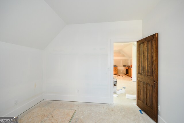 bonus room with vaulted ceiling