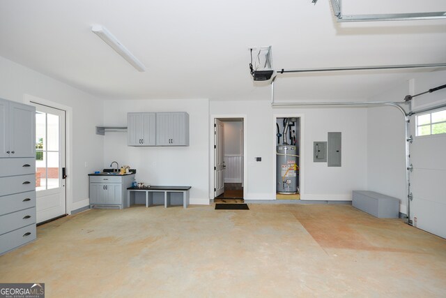 garage featuring a garage door opener and gas water heater