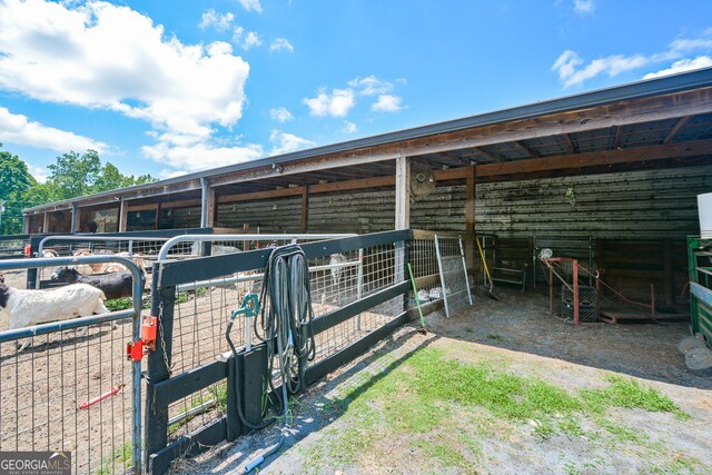 view of stable with an outdoor structure