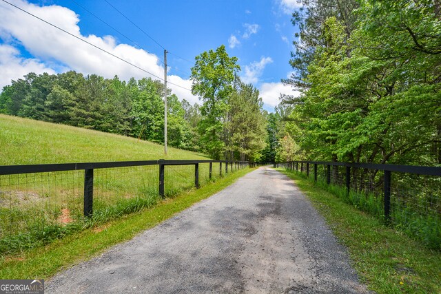 view of road featuring a rural view