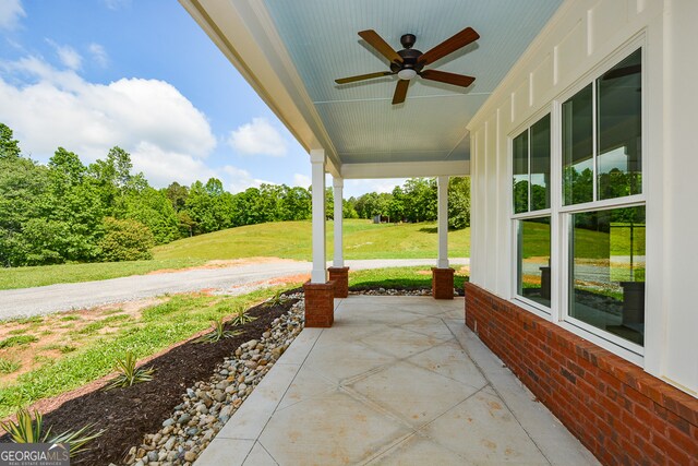 view of terrace with ceiling fan