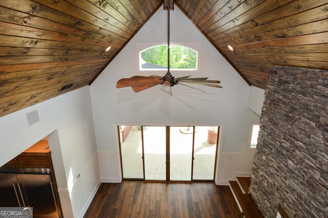 room details with ceiling fan, hardwood / wood-style flooring, and wood ceiling