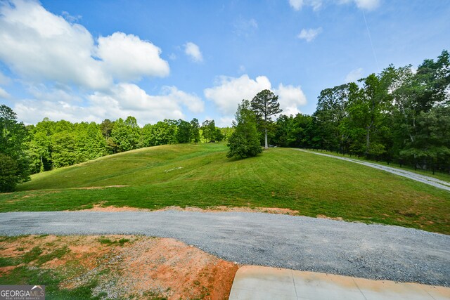 surrounding community with a lawn