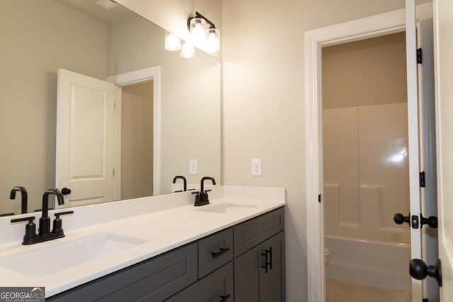 bathroom with vanity and tile patterned floors