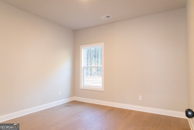 empty room featuring light hardwood / wood-style floors