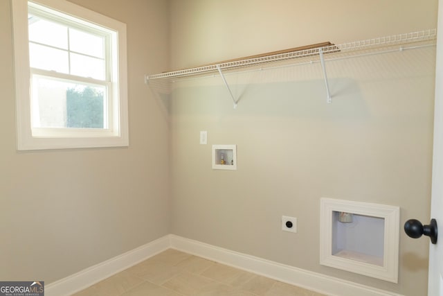 laundry area featuring hookup for a washing machine and hookup for an electric dryer