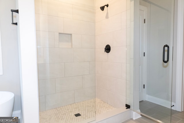 bathroom featuring plus walk in shower