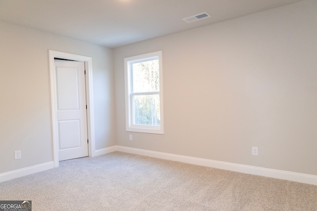 view of carpeted spare room