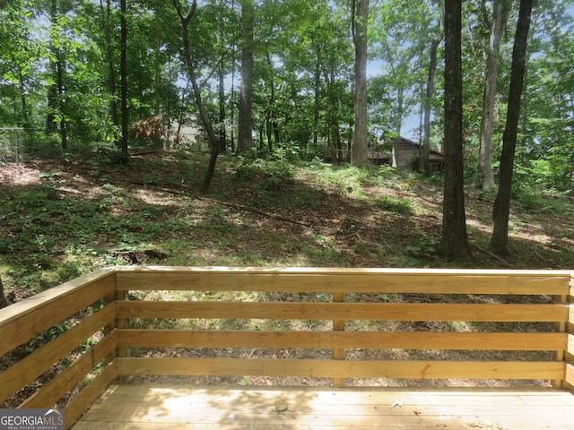 view of yard with a wooden deck