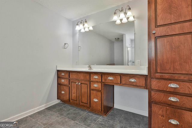 bathroom featuring tile floors and vanity