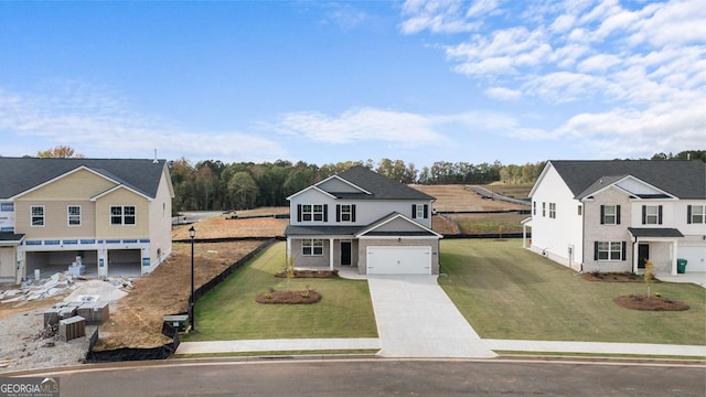 view of front of property with a front lawn and a garage