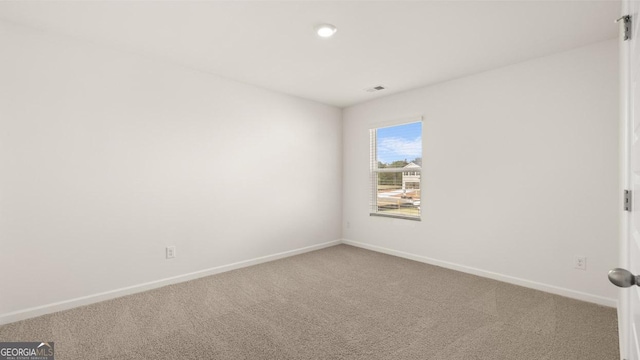 view of carpeted spare room