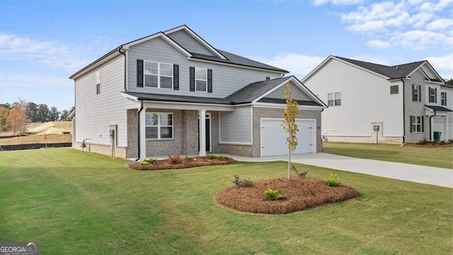 view of front facade with a garage and a front yard