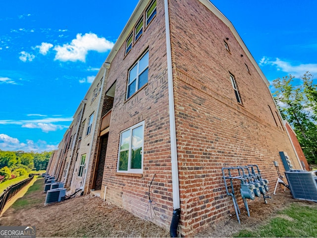 view of home's exterior featuring central air condition unit