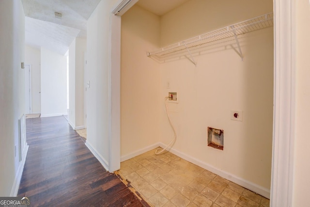 washroom with electric dryer hookup, washer hookup, and wood-type flooring