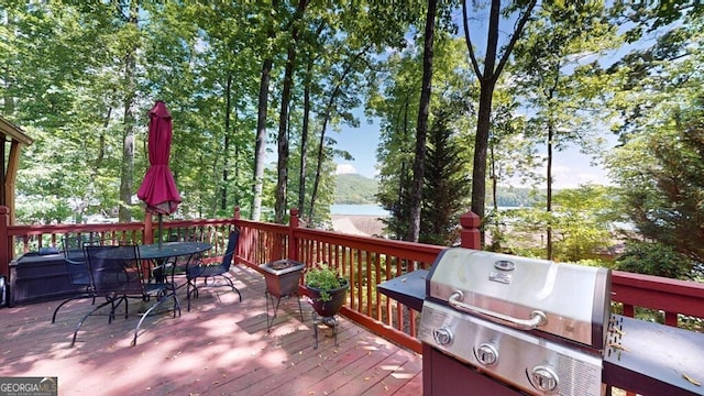 wooden deck featuring grilling area