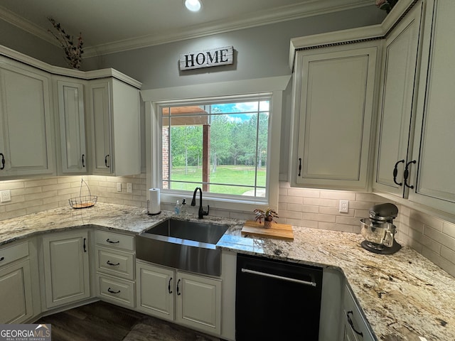 kitchen with sink, dishwasher, crown molding, and backsplash