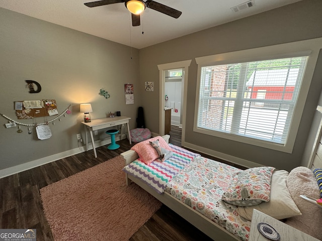 bedroom featuring dark wood-type flooring and ceiling fan