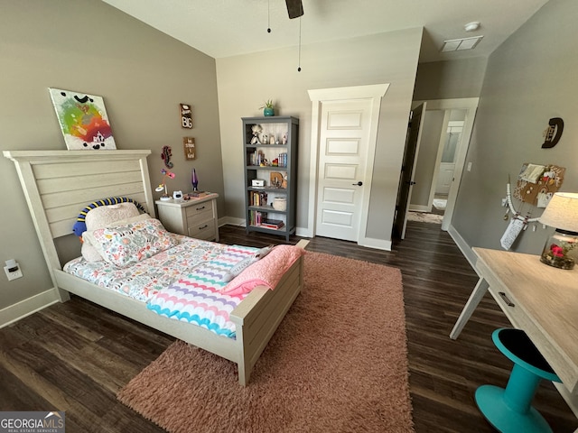 bedroom with dark hardwood / wood-style floors, ceiling fan, and lofted ceiling