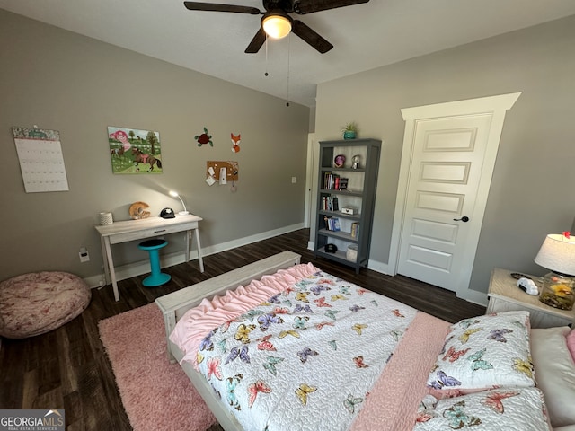 bedroom with ceiling fan and dark hardwood / wood-style flooring