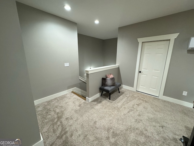 unfurnished room featuring carpet floors