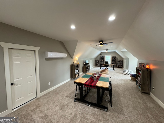 game room with lofted ceiling, carpet flooring, a wall unit AC, and ceiling fan