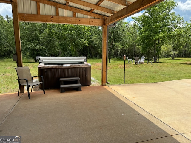 view of patio with a hot tub