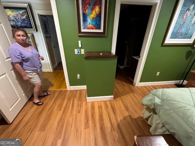 interior space featuring light hardwood / wood-style floors and a closet