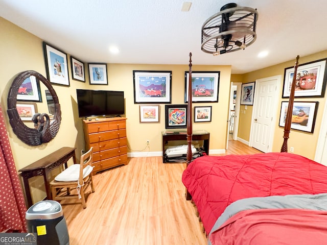 bedroom featuring hardwood / wood-style flooring