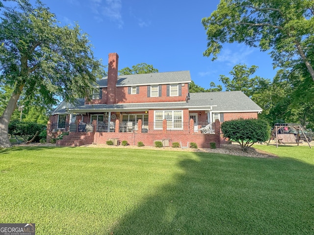 view of front facade with a front yard