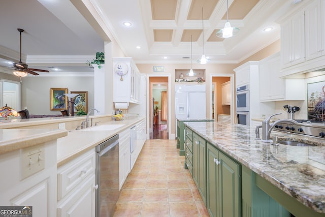 kitchen featuring green cabinets, appliances with stainless steel finishes, white cabinets, sink, and ceiling fan