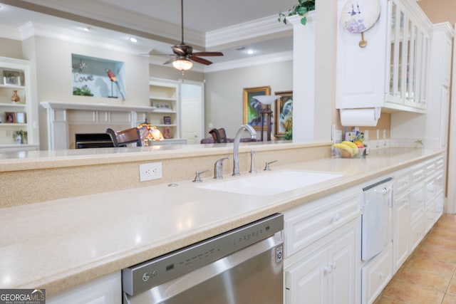 kitchen featuring ceiling fan, dishwasher, light tile flooring, and white cabinetry