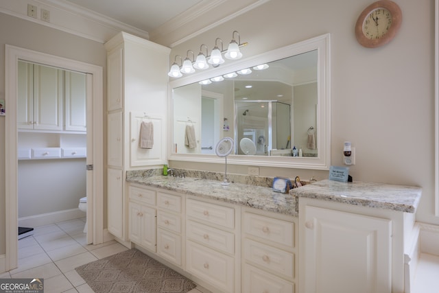 bathroom featuring tile flooring, walk in shower, ornamental molding, toilet, and vanity