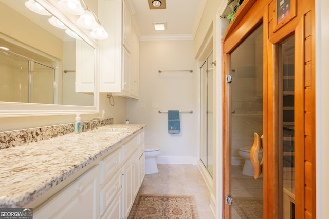 bathroom with crown molding, oversized vanity, walk in shower, tile floors, and toilet