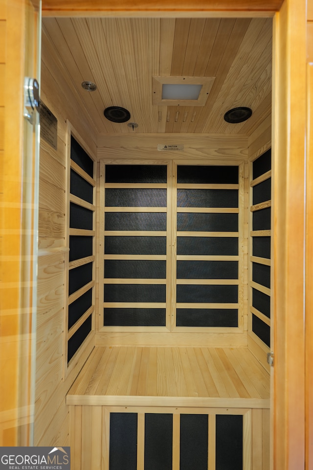 view of sauna / steam room featuring wood ceiling