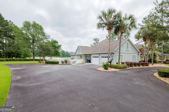 view of front of property featuring a garage