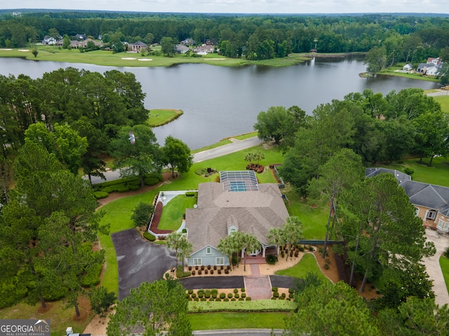 birds eye view of property with a water view