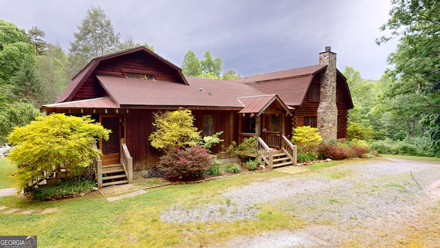 view of log-style house